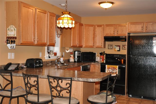 Full kitchen with island.